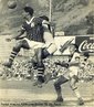 Jogo de futebol entre os times cariocas Fluminense e Vasco da Gama. <br><br/> Palavras-chave: relaes culturais, esporte, futebol, competio. 